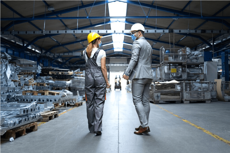 man and woman in the warehouse
